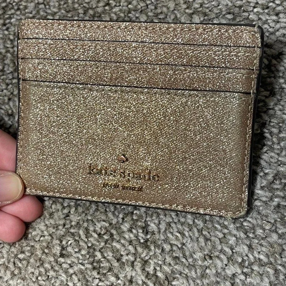 Kate Spade New York gold glitter card holder
